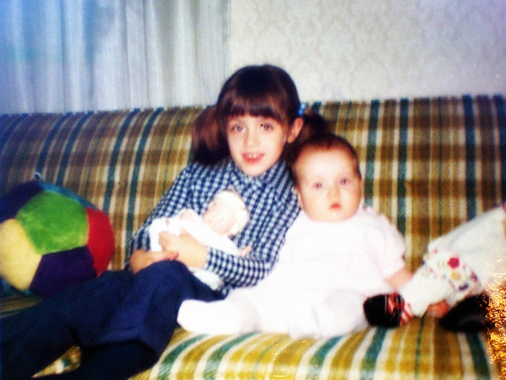 Sisters in the 70's - gold and green plaid sofa - thetemenosjournal.com