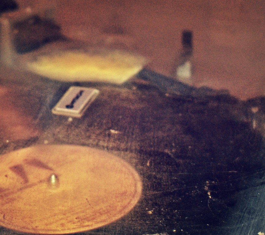 and old record player playing vinyl - thetemenosjournal.com