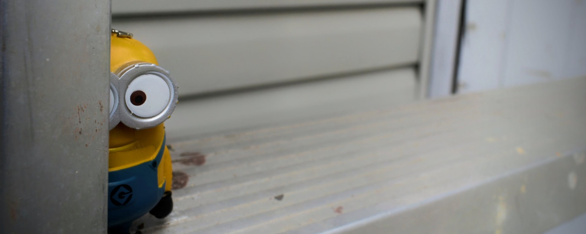 minion figure on a ladder - thetemenosjournal.com