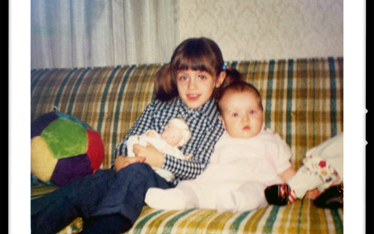 sisters on old 70s pukey green sofa