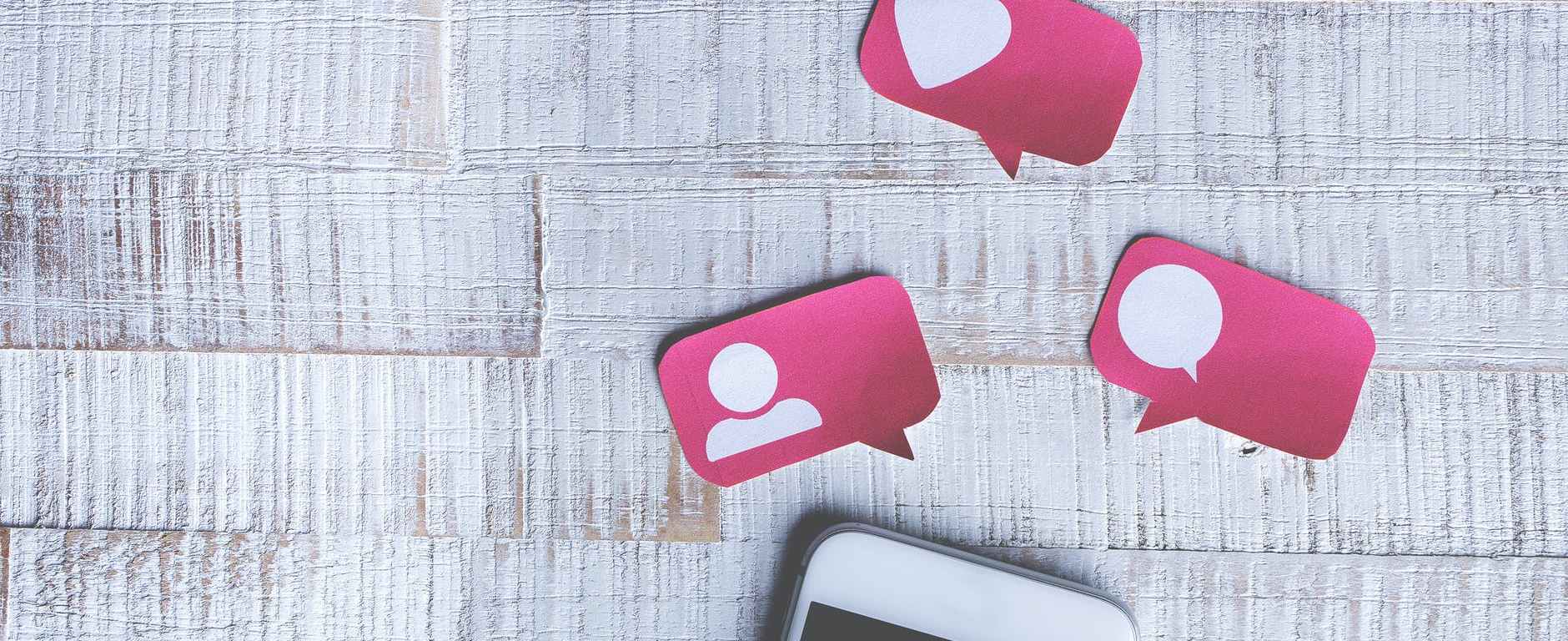 white smartphone with social media icons